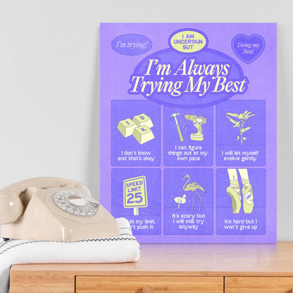 A self-care art print with the text "always trying my best" on a table next to a telephone