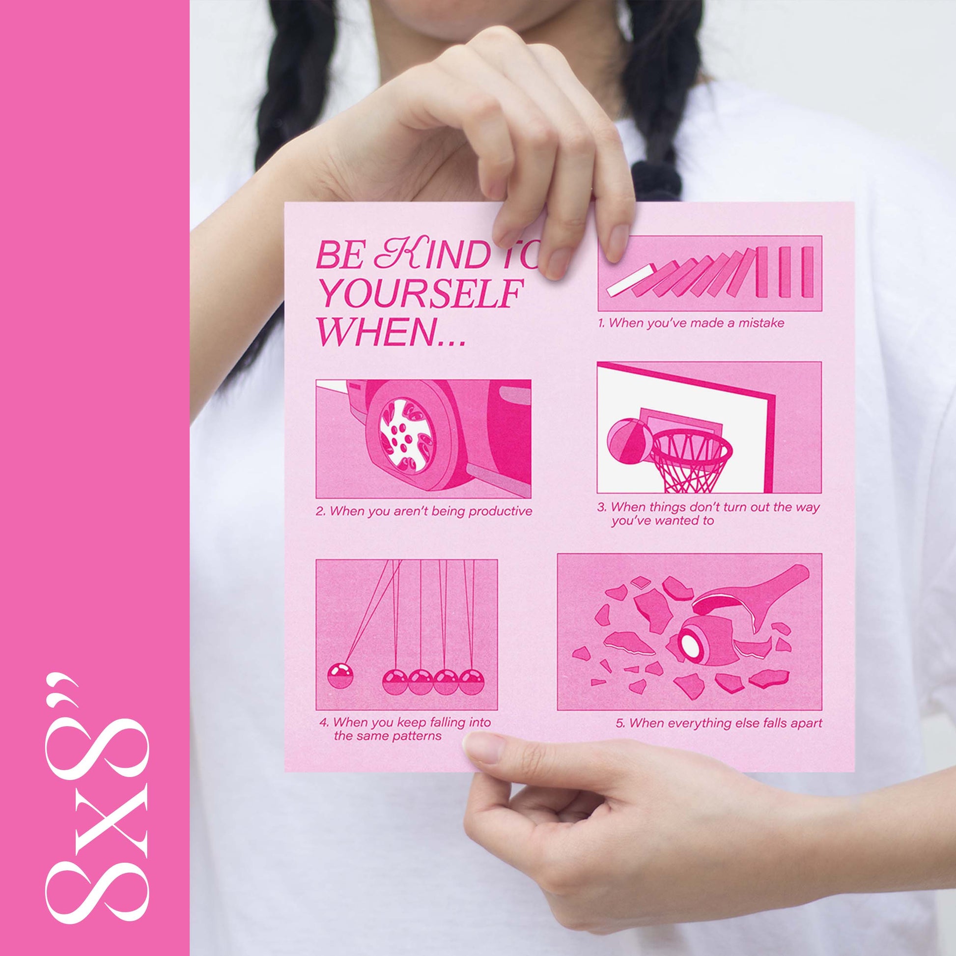 A girl holding an 8x8" size pink self-care art print with the text "be kind to yourself"